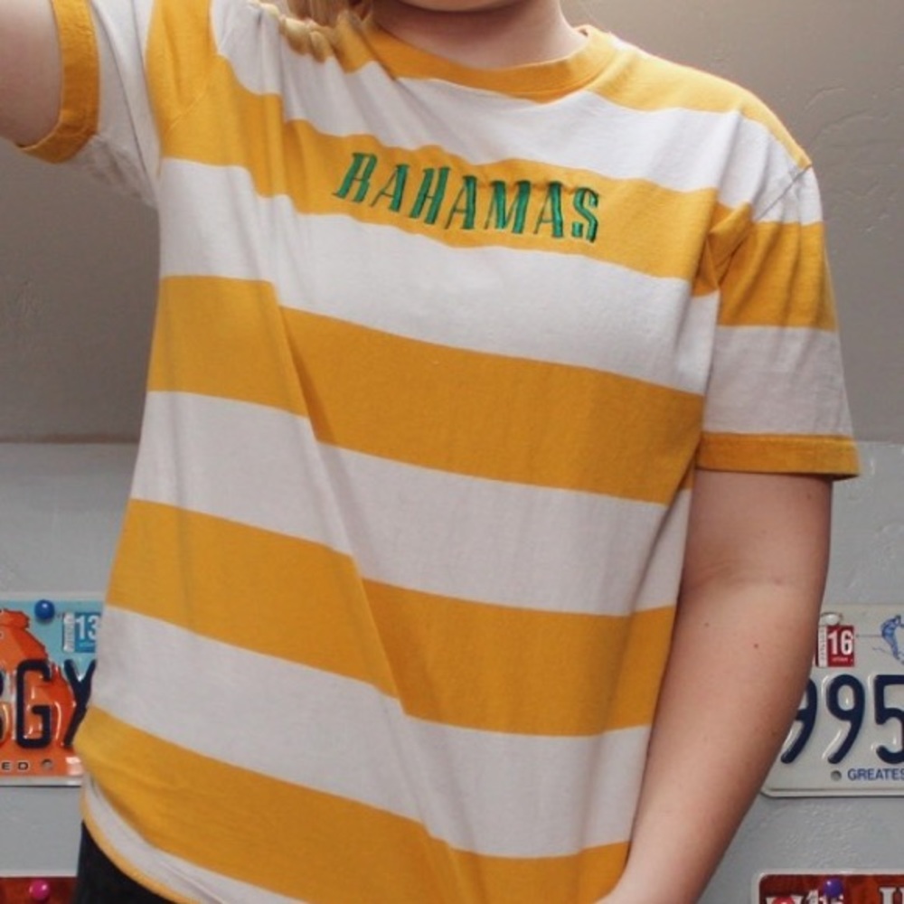 “bahamas” lettering on orange & white striped tee